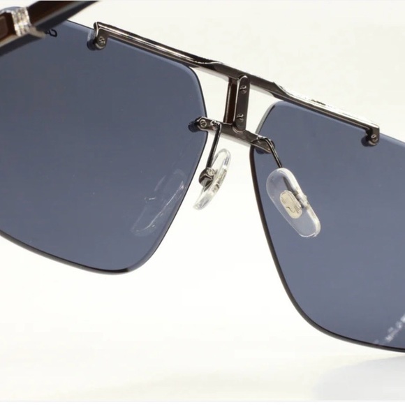 Carrera 1054/S V81IR Ruthenium Grey Rimless
Designer Sunglasses - Picture 6 of 10
